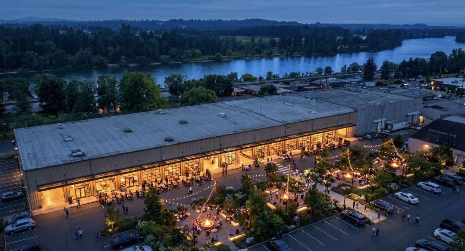 Evening riverfront arts district market concept